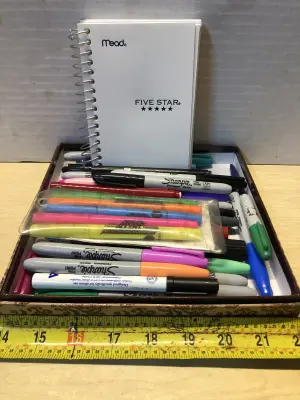Lot of markers and mini notebook