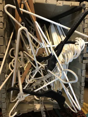 Tote of plastic hangers