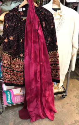 Shirt and pants size medium, dress size medium, skirt size medium