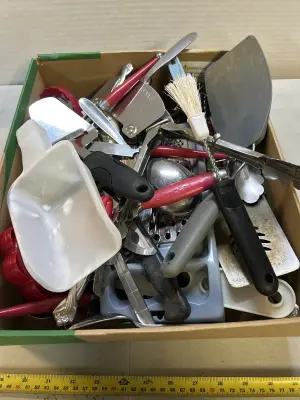 box of kitchen utensils, and cutlery