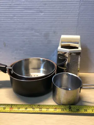 2 pots no lids stainless steel measuring cup and food grater