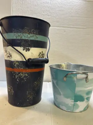 2 metal buckets