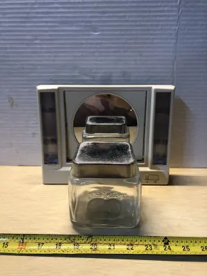 Glass jar and makeup mirror as is