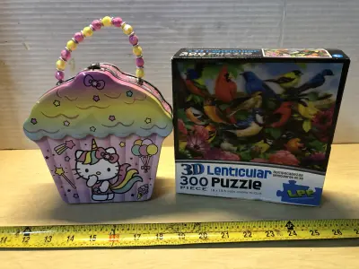 Hello kitty tin and bird puzzle