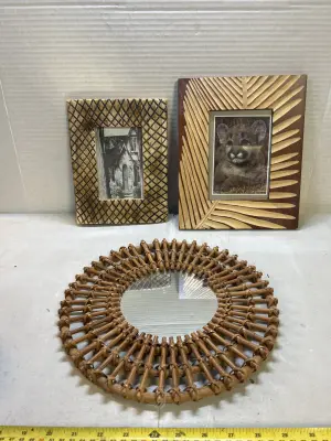 2 picture frames and a mirror