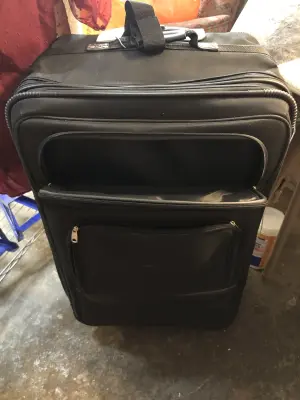 Large suitcase on wheels