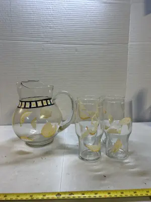 lemon pitcher with 4 glasses