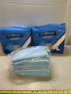 2 Large adult absorbent underwear and bed pads