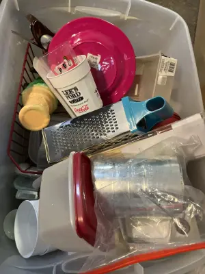 A lot of dishware and Tupperware