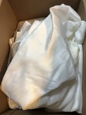 Box of white curtains