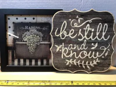 Framed image of raisins and wooden sign