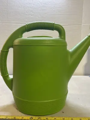 plastic watering pale needs cleaned