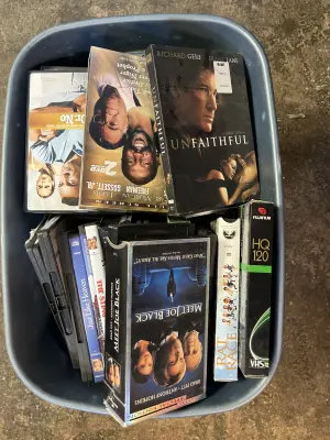 tote of dvds, VHS tapes