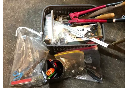 Tote of random hadware and tools