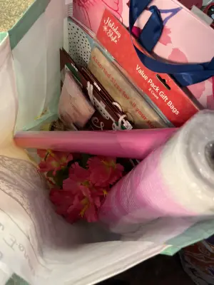 bag of lots of crafts, artificial flowers, wrapping paper& gift bags