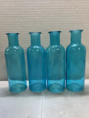4 small decorative bottles