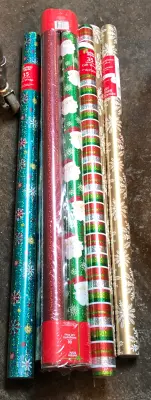 8 rolls  of Christmas wrapping paper