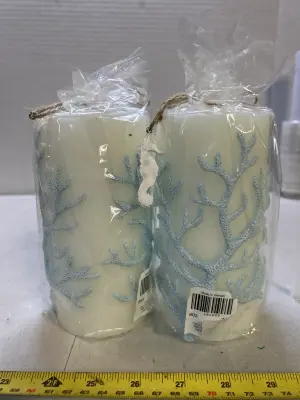 two decorative beach candles