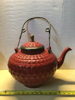 Large red tea pot for decorative use only
