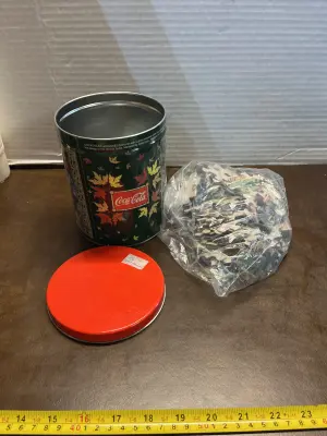 puzzle with coca-Cola tin