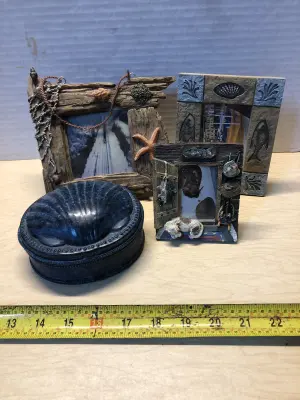 3 ocean inspired photo frames and a shell tin