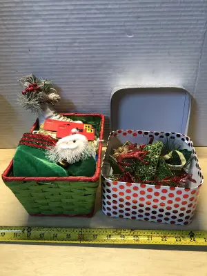 Basket of fabric Christmas bags and box of Christmas ornaments