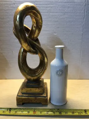 Bottle vase and infinity statute