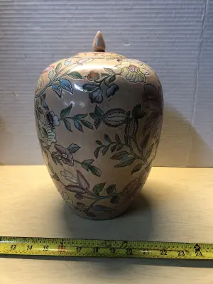 Hand decorated porcelain pot