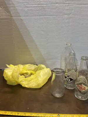 bag of vintage bottles