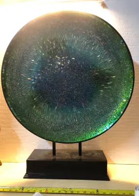 Large decorative plate on stand