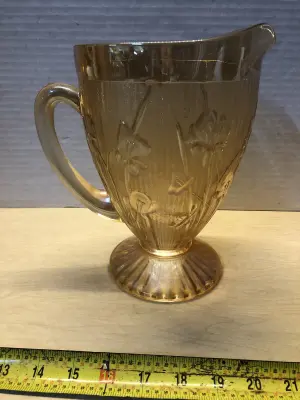 Amber  carnival glass pitcher