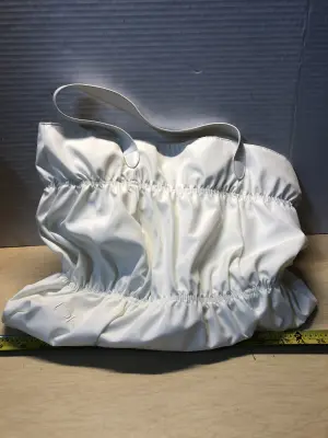 White Donna Karan cosmetics bag