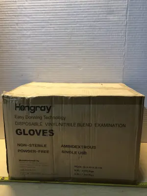 Box of medium sized vinyl powder free gloves