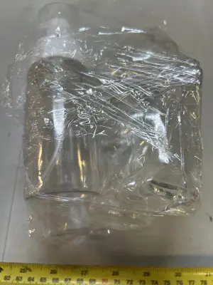 2 foaming bottles and labubu case