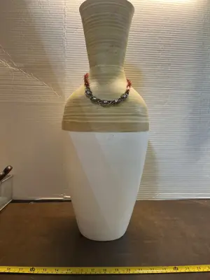 large vase with necklace?