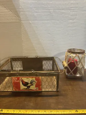 metal egg crate , decorative jar & candle