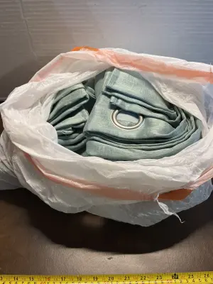 bag of lot of curtain panels