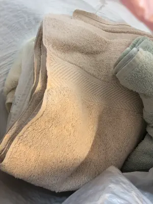 Bag of used bath towels