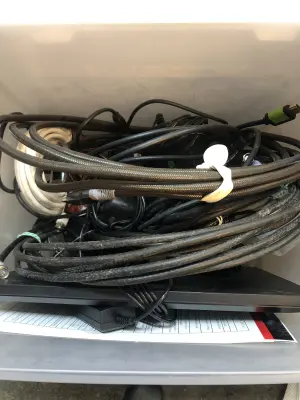 Tote of assorted cords