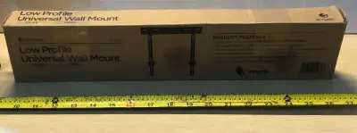 Low profile universal wall mount for 23-65” TVs up to 66lb box opened as is