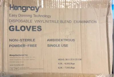Box of medium sized vinyl powder free gloves