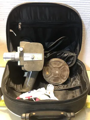 Small glue gun, black case, Vintage Regal keystone 8mm camera with film as is