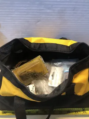 DeWalt bag with assorted nails and screws