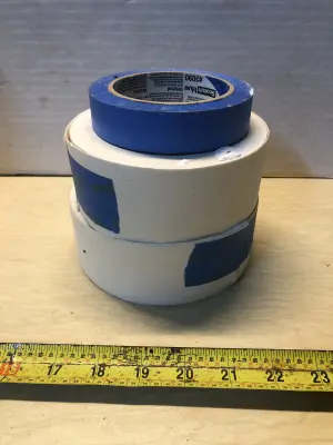 2 rolls dry wall tape and roll of painters tape