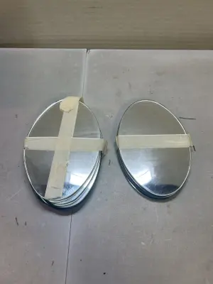 11 small oval mirrors