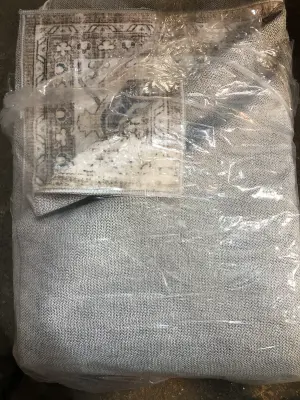 Unknown size area rug