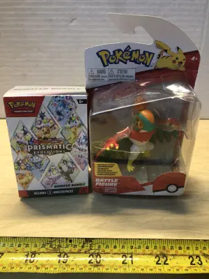 Pokémon booster bundle and battle figure