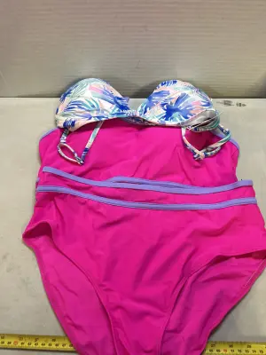 large swimsuit and 1 top