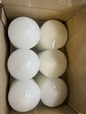 6 tall white candles