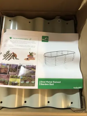 Oval metal raised garden bed
